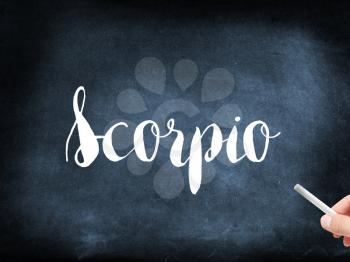 Scorpio written on a blackboard