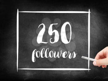 250 followers written on a blackboard
