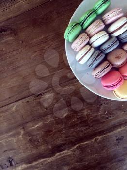 Macaroons on a wooden background