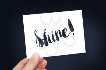 Shine written on card
