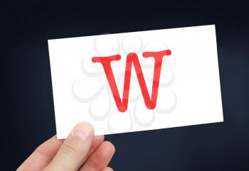 The letter W on a card