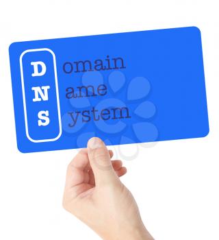 Domain Name System explained on a card held by a hand
