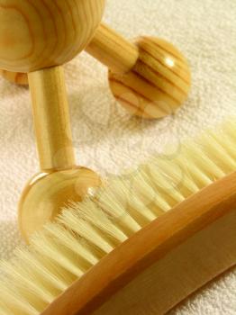 Royalty Free Photo of a Brush and Wooden Massager