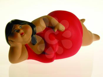 Royalty Free Photo of a Comical Figurine of a Large Woman