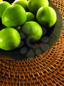 Royalty Free Photo of Limes in a Bowl