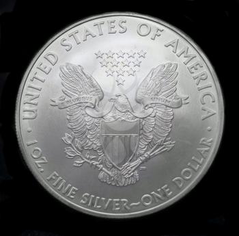 American silver eagle dollar coin over black