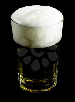 glass of lager  beer over black background