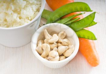 fresh cashew nut and vegetables,with steamed white rice ,typical ingredients of chinese cuisine