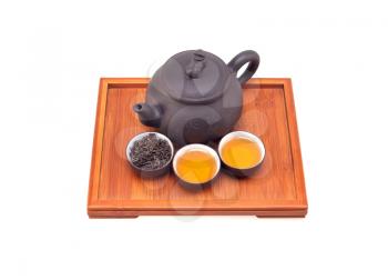 chinese green tea clay pot and cups on bamboo wood tray isolated over white