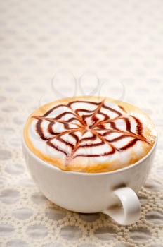 classic Italian cappuccino cup with topping decoration pattern