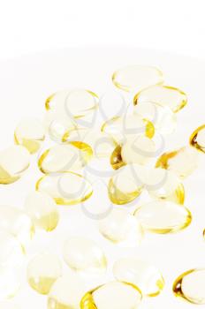 bounch of gel translucent pills on white background