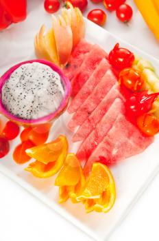 mixed plate of fresh fruits,pitaya or dragon fruit with watermelon, orange,apple and cherry tomatoes,MORE DELICIOUS FOOD ON PORTFOLIO