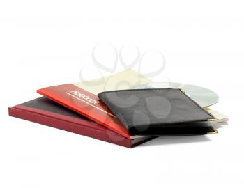 assorted notebooks and cd isolated on white background