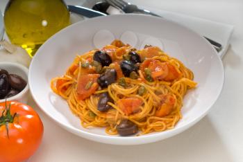 spaghetti pasta with fresh home made  puttanesca sauce