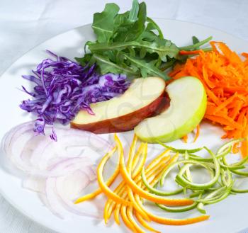 fresh salad ingredient prepared cutted on a plate 