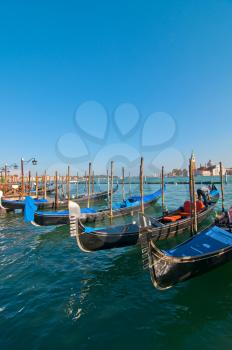 Venice Italy pittoresque view of gondolas  with Saint George island on background