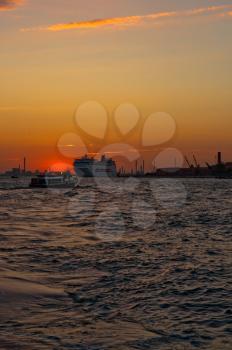 Venice Italy sunset with cruise boat very pittoresque view