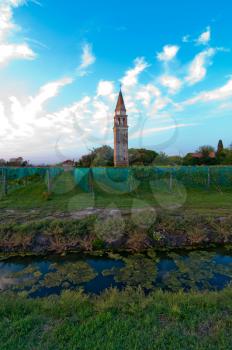 Venice Burano Mazorbo vineyard with campanile belltower of Saint Caterina on background