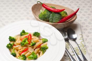 Royalty Free Photo of Penne With Broccoli and Red Peppers