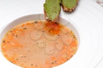 Royalty Free Photo of Soup With Pesto Crostini