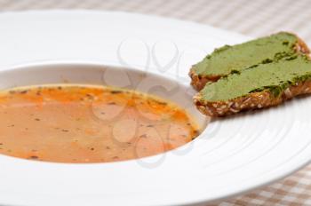 Royalty Free Photo of Soup With Pesto Crostini