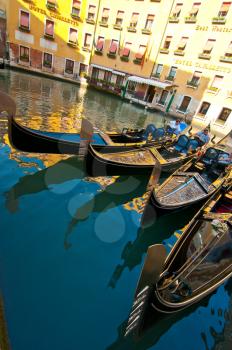 Royalty Free Photo of Gondolas Parked on a Canal