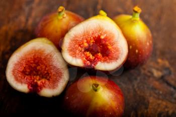 fresh figs macro closeup over old wood boards