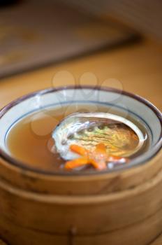 Japanese style abalone soup empty shell  on bamboo bowl set holder