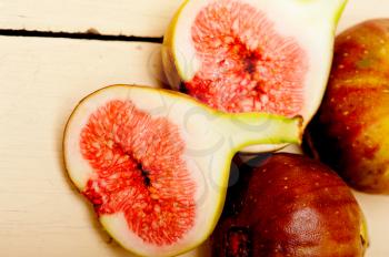 fresh ripe figs on a rustic white table