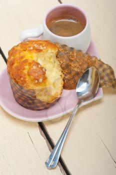coffee and muffin served on a pink heart shaped dish