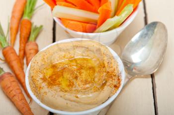 fresh hummus dip with raw carrot and celery arab middle eastent healthy food 