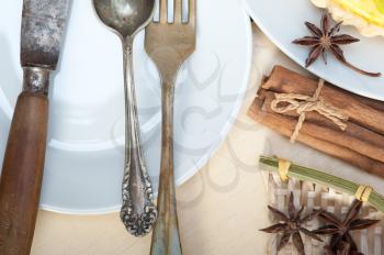 rustic table set  and spices knife spoon fork view from top