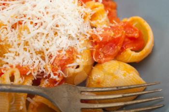 Italian snail lumaconi pasta with ripe cherry tomatoes sauce ingredients