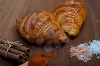 french traditiona croissant brioche butter bread  on wood