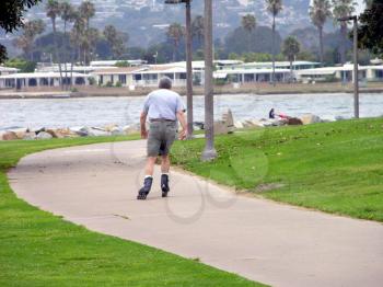Royalty Free Photo of a Man Rollerblading