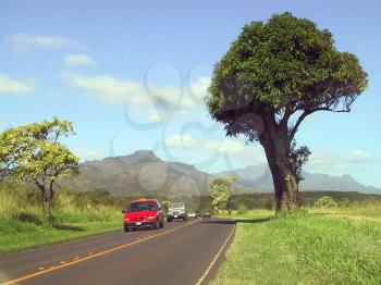 Royalty Free Photo of Cars On Road In Kauai, Hawaii