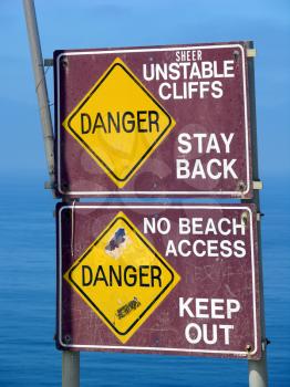 Royalty Free Photo of Danger Signs At Beach Cliffs