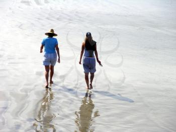 Royalty Free Photo of Two Women Walking on the Beach