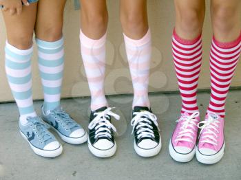 Royalty Free Photo of Girls Wearing Funky Socks