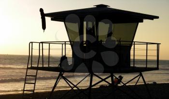 Royalty Free Photo of a Lifeguard Tower At Sunset