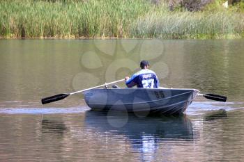 Royalty Free Photo of a Person in a Boat