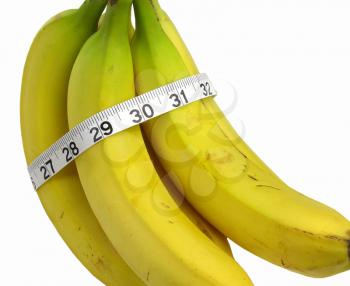 Royalty Free Photo of Bananas Wrapped With A Measuring Tape