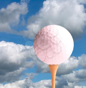 Royalty Free Photo of a Golf Ball on a Tee