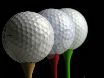 Royalty Free Photo of Golf Balls on Tees