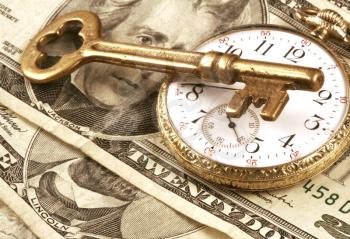 Royalty Free Photo of a Pocket Watch and Money