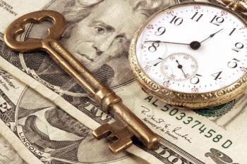 Royalty Free Photo of a Pocket Watch and Money