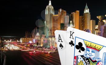 Royalty Free Photo of Playing Cards and The Strip in Las Vegas