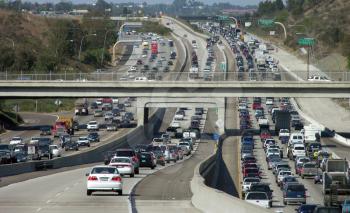 Royalty Free Photo of Traffic Congestion on Both Sides of a Freeway