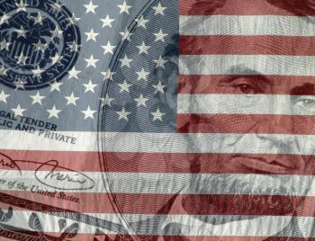 Royalty Free Photo of US Currency and the American Flag