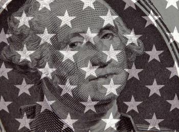Royalty Free Photo of US Currency and the American Flag